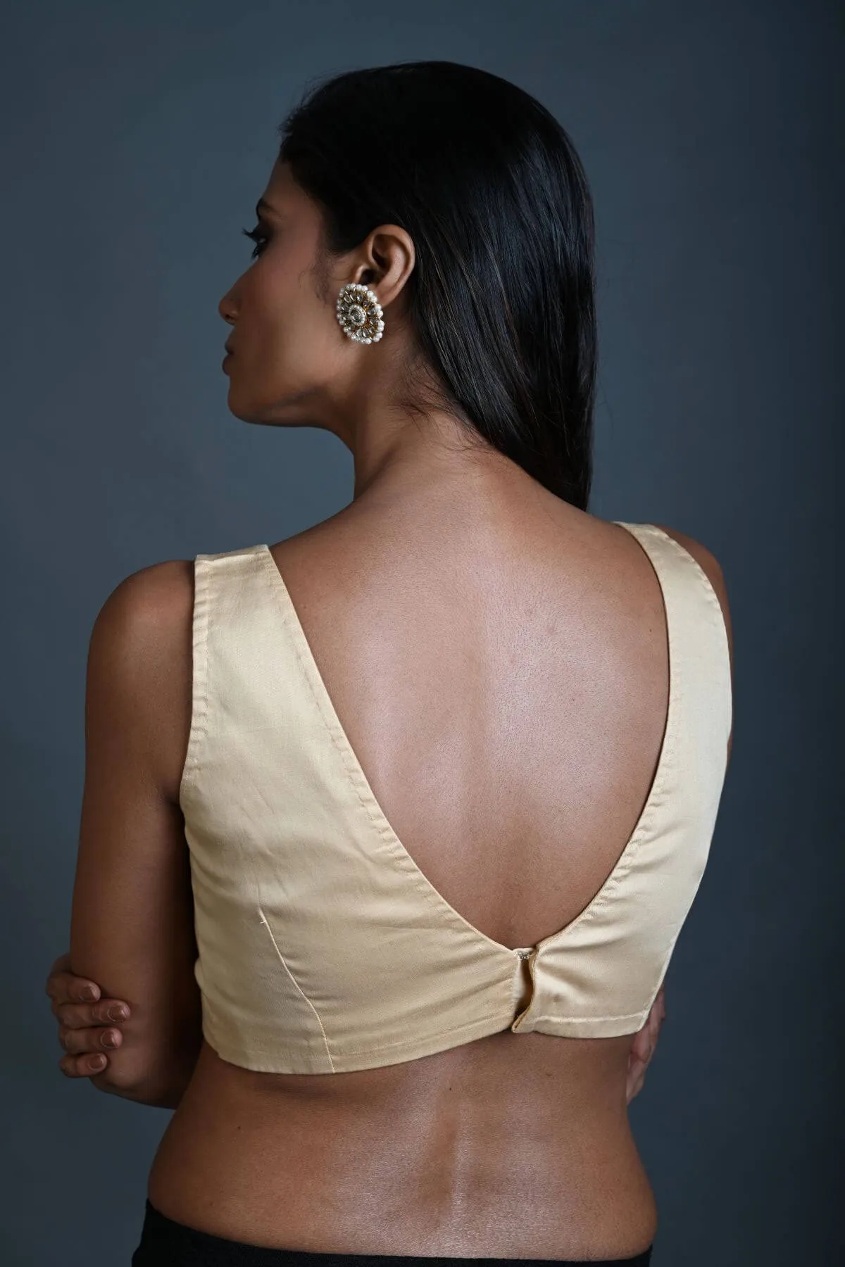 Cream Sleeveless Blouse in Cotton with V Neckline and Back Closure