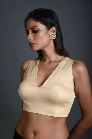 Cream Sleeveless Blouse in Cotton with V Neckline and Back Closure