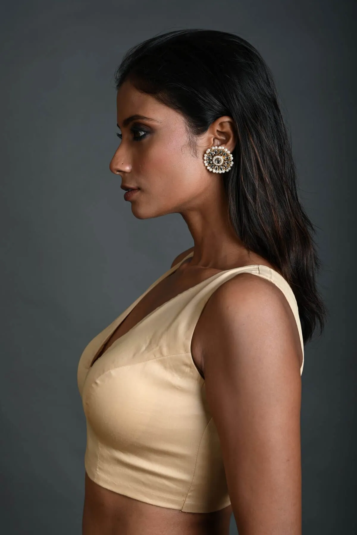 Cream Sleeveless Blouse in Cotton with V Neckline and Back Closure